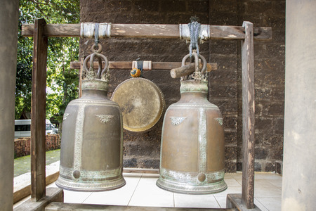 Bells of  the old temple of Wat Phrathat Phu Khao,  literally, temple on the hill at Sop Ruak, Northern Thailandの写真素材