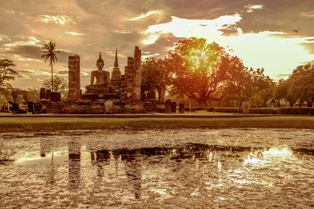 Wat mahathat  in Sukhothai historical  at sunsetThailandの写真素材