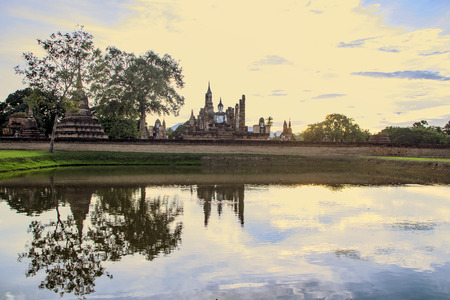 Wat mahathat  in Sukhothai historical  at sunsetThailandの写真素材