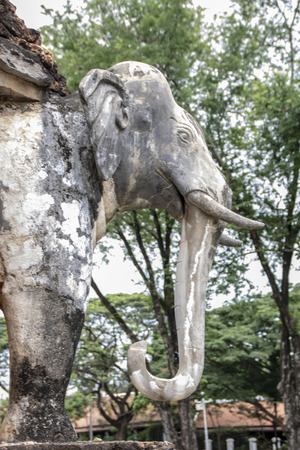 Wat Sorasak,  a  small temple dating back to 1412. The base of the chedi is surrounded by the statues of 24 elephants, in Sukhotai national park, Thailandのeditorial素材