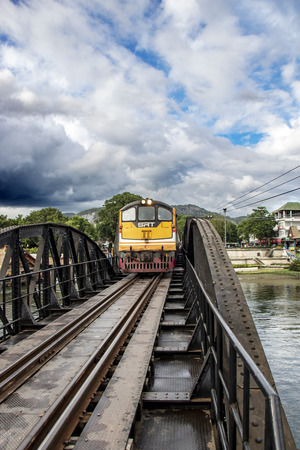 At Kanchanaburi - Thailand - on august  2019 - train travelling on the Bridge over river kwai at Kanchanaburi, Thailandのeditorial素材