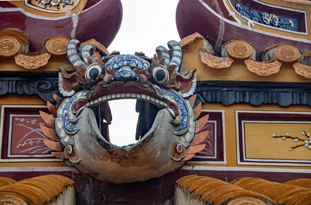 Decorations on the roof of building of The Tomb of Tu Duc, at Hue city, Vietnamの写真素材