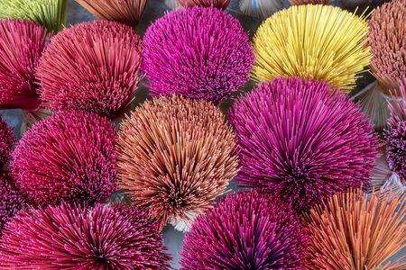 multicolored incense sticks handcrafted at Hue city , Vietnamの写真素材