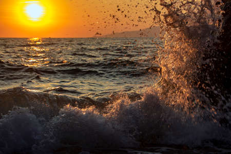 Scenic sunset on the beach of Santa Teresa at Maratea in Basilicata, Italyの写真素材