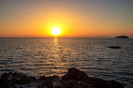 breathtaking sunset on you coast of Diamante, Calabria region, Italyの写真素材