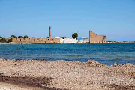 Ancient tonnara and Sveva tower in the Vendicari Nature Reserve wildlife oasis, located between Noto and Marzamemi, Sicily, Italy.の写真素材