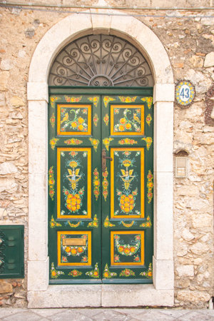 Decorated doors on the houses of Taormina, Sicily, Italyの写真素材
