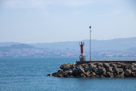 At Vigo, Spain, On 08-27-22, lighthouse in the harbor and seascape of Rias Baixasの写真素材