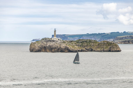 Mouro Island (Spanish: Isla de Mouro), a small uninhabited island in the Bay of Biscay, located off the Magdalena Peninsula at Santander, Spainのeditorial素材