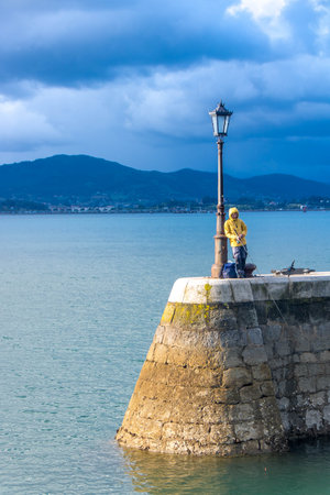 At Santander, Spain, On August 2023, fisherman on the waterfrontのeditorial素材