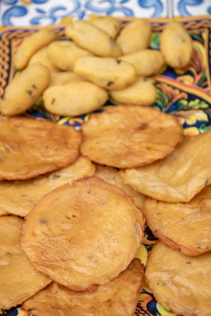 Plate of panelle, Sicilian Chickpea Fritters, At Ballaro market, Palermo, Sicily, Italyの写真素材