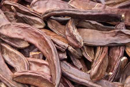 Carobs in the food market of Ballaro, Palermo, Sicily, Italyの写真素材
