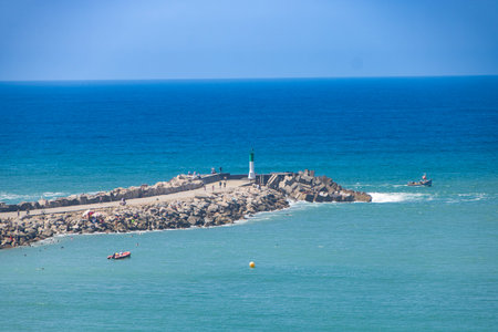 Lighthouse of Fort of Calette st Rabat, overlooking Atlantic oceanの写真素材