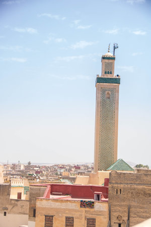 aerial view of the Medina with university and the karaouine mosque green roof and minaret at Fes in Moroccoの写真素材