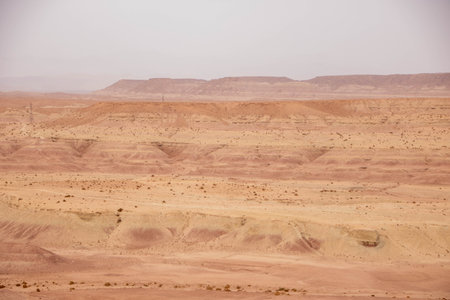 Landscape of desert and dunes as seen from the kasbah of Ait-Ben-Addou in Moroccoの写真素材