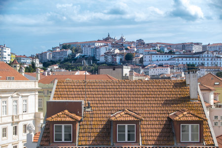 View of the city of Coimbra and its historic center on a hillの写真素材