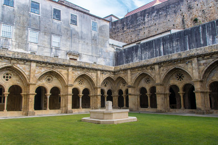 The cloister of the Old Cathedral of Coimbra (Portuguese: SÃ© Velha de Coimbra), a Romanesque...