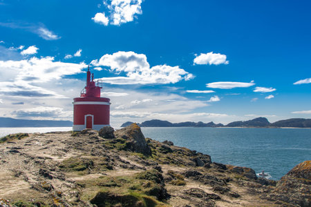 FARO DE PUNTA ROBALEIRA, Robaleira lighthouse, in Cangas, Pontevedra province, Galicia, Spainの写真素材