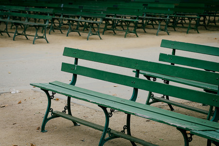 Green Park Benches in a Rowの写真素材
