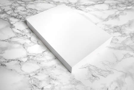 Lying white book on marble background. 3D mock up blank.の写真素材