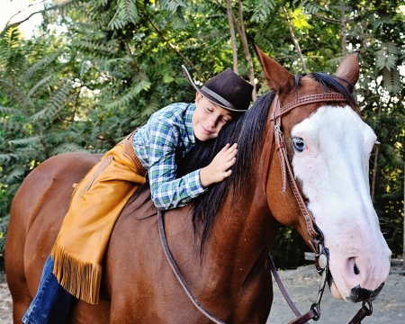 Young Boy with Horseの写真素材