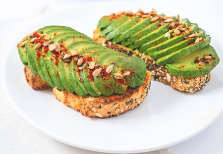 sourdough toast with avocado and spanish paprika powder