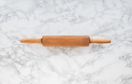 Rolling pin on a marble counter, horizontal positionの写真素材