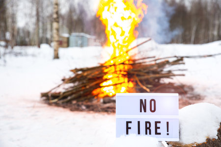 Open fire warning in the winterの写真素材
