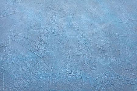 A ready-made abstract textured blue gray background with blurred edges.