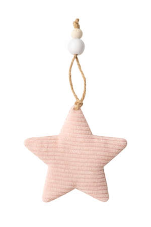 Christmas tree toy made of pink velvet fabric in the star shape isolated on a white background. Decor element, decoration for the New Year.の写真素材