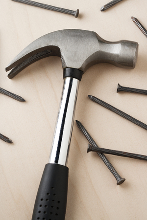claw hammer and nailsの写真素材