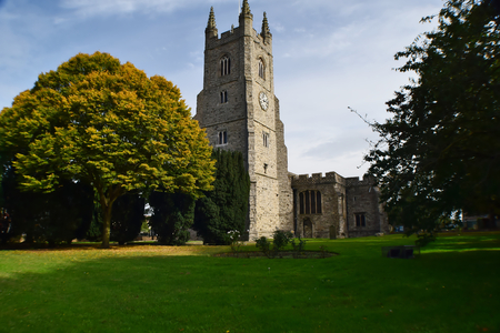 Garden And Old Stone Churchの写真素材