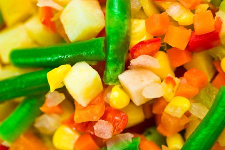 Chopped vegetables mixture. Potato, green bean, broccoli, corn, carrot, onion and sweet pepper.の写真素材