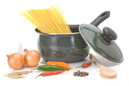 Saucepan with ingredients for chicken soup over white backgroundの写真素材