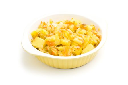 Bowl of braised potatoes isolated on a white backgroundの写真素材