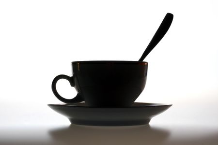 Silhouette of a coffee cup on a white backgroundの写真素材