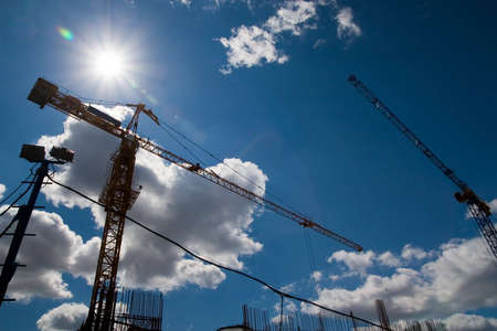 The building crane on a background of the blue skyの写真素材