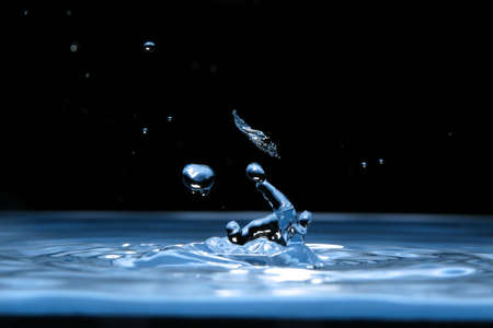 Water splashing. Movement of water is frozen by means of flash