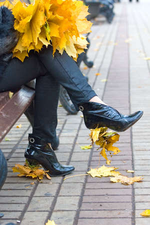 Autumn leaves not heels of female footwearの写真素材
