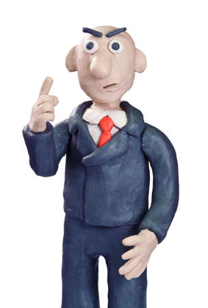plasticine businessman in a suit over whiteの写真素材