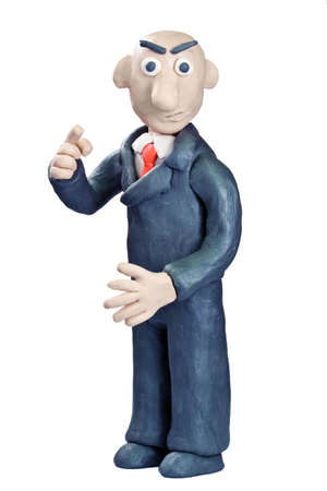 plasticine businessman in a suit over whiteの写真素材