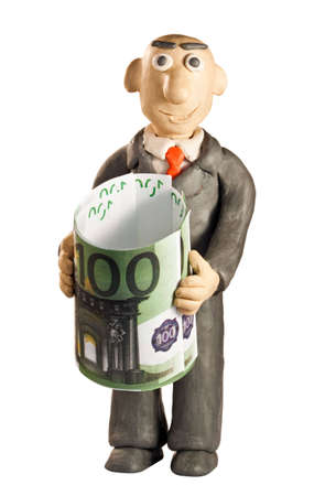 plasticine businessman with money over white backgroundの写真素材