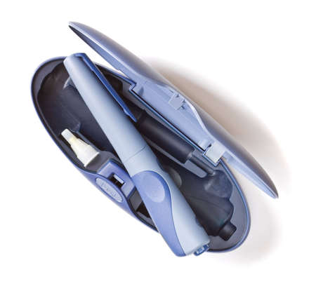 Insulin pen in a compact case isolated on whiteの写真素材