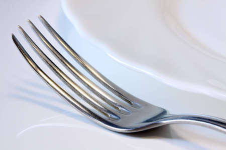 Close-up of fork on the plateの写真素材