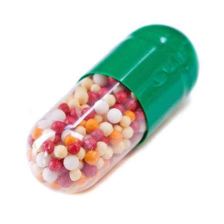 close-up photo of a green pill