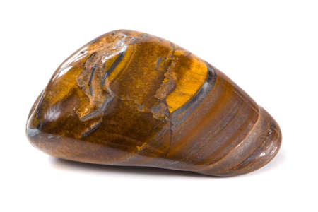 Tiger Eye mineral isolated on a white backgroundの写真素材