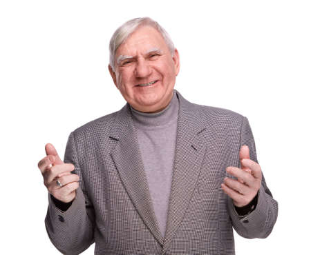 smiling senior man on a isolated white backgroundの写真素材