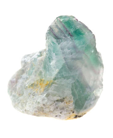 Diopside mineral isolated on a white backgroundの写真素材