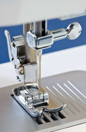 Detail of sewing machine close-up. Focus on needleの写真素材