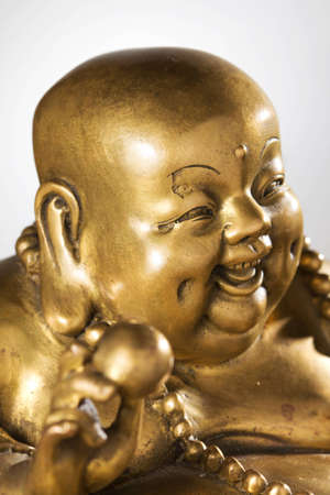 Figurine Cheerful Hotei. Chinese God of Wealth.の写真素材